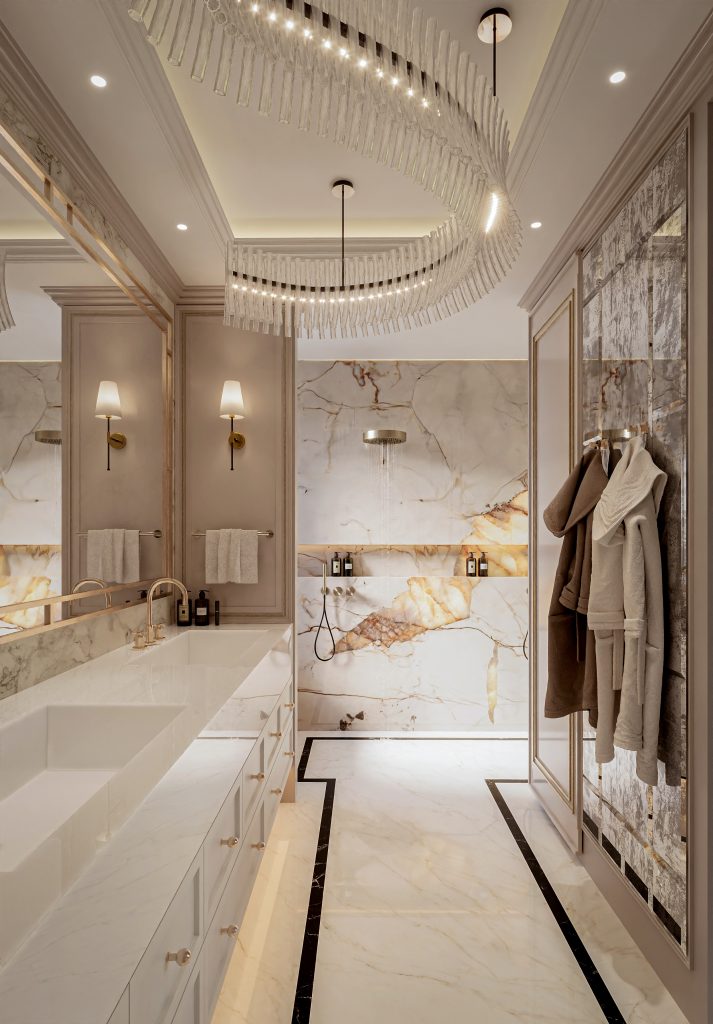 Master bathroom with gold-veined marble walls, a long vanity and layered lighting